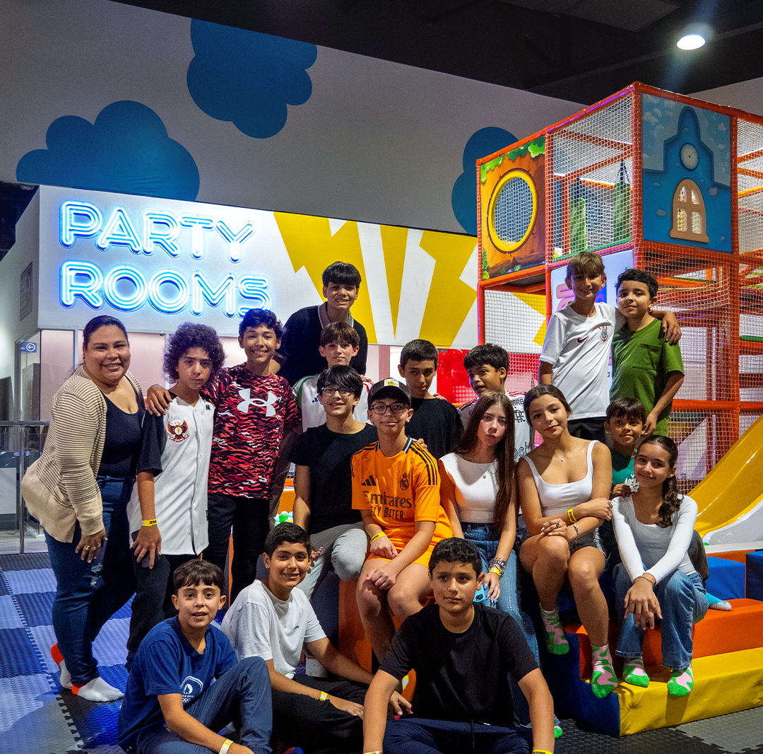 close up of happy kids feet jumping with special grip socks